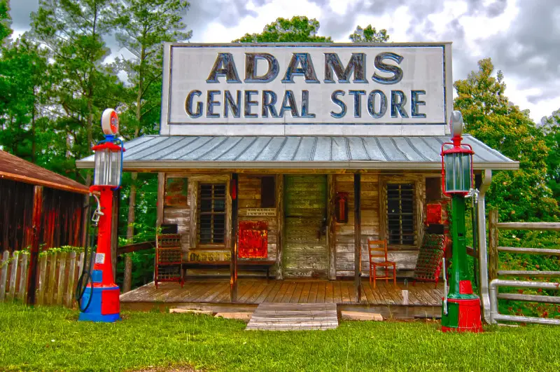 Old Adams General Store with gas pumps. 1915~Troy, Alabama