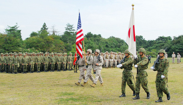 A ceremony is held to mark the start of a joint exercise between the US Marine Corps and the Japan Ground Self-Defense Force